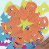 Faire un flocon de neige avec une serviette en papier