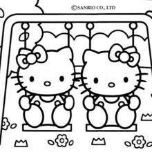 Coloriage de Hello Kitty sur la balançoire